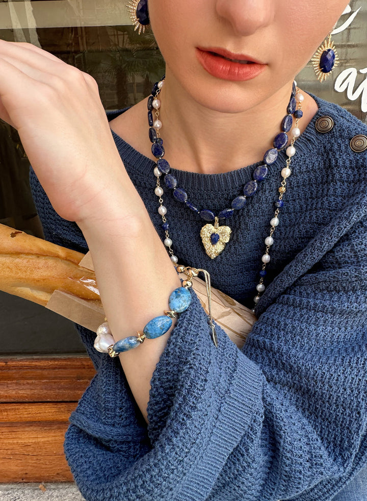 This exquisite bracelet features genuine agate stones, each uniquely patterned, accompanied by the organic allure of baroque pearls and the timeless charm of freshwater pearls.