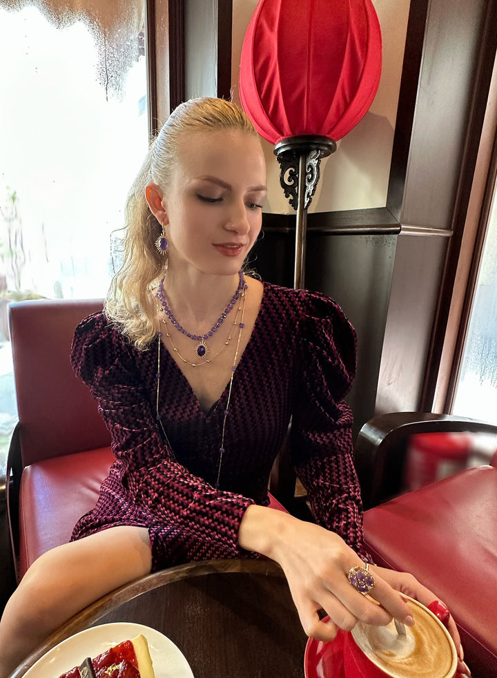 Crafted with precision, this stunning piece features a captivating Amethyst centerpiece, renowned for its deep purple hue and spiritual significance
