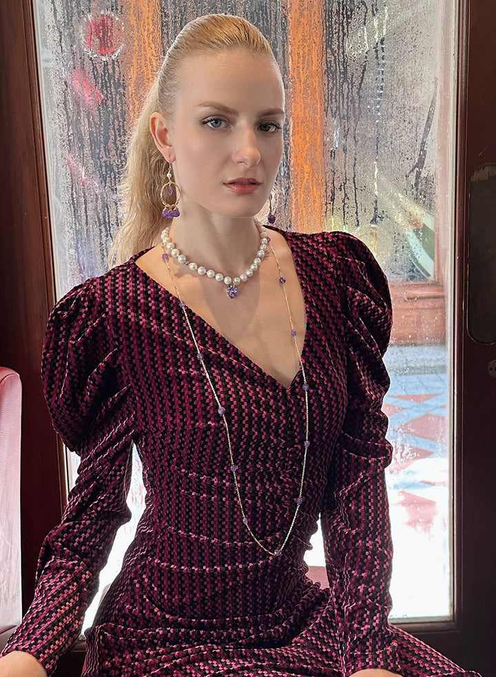 This exquisitely crafted necklace features a lengthy chain, allowing for versatile styling and effortless sophistication.
