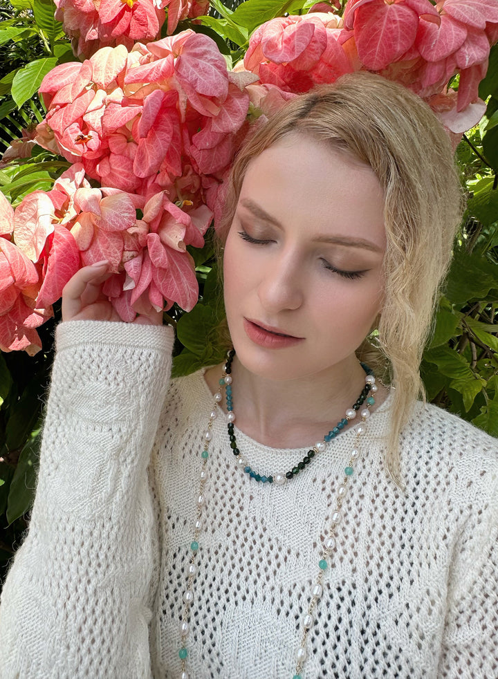 a harmonious blend of natural beauty and contemporary elegance. Adorned with captivating Apatite stones, complemented by the soothing hues of Agate, and delicately accented with lustrous Freshwater Pearls, this necklace is a timeless statement piece.