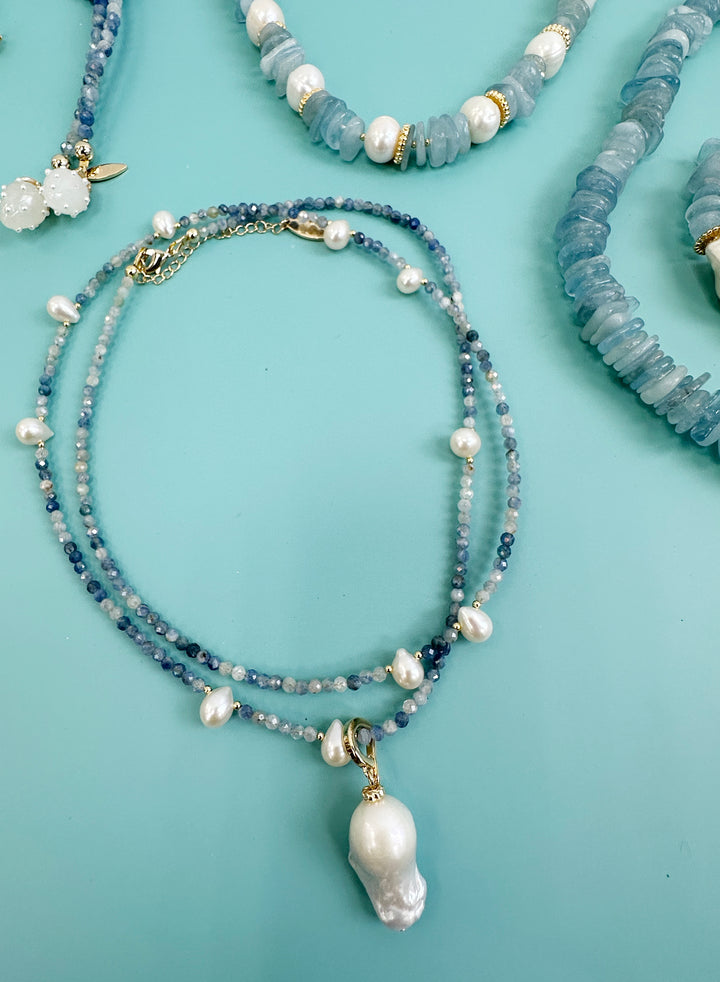 The removable Baroque Pendant adds a touch of versatility, allowing you to effortlessly transition from day to night.