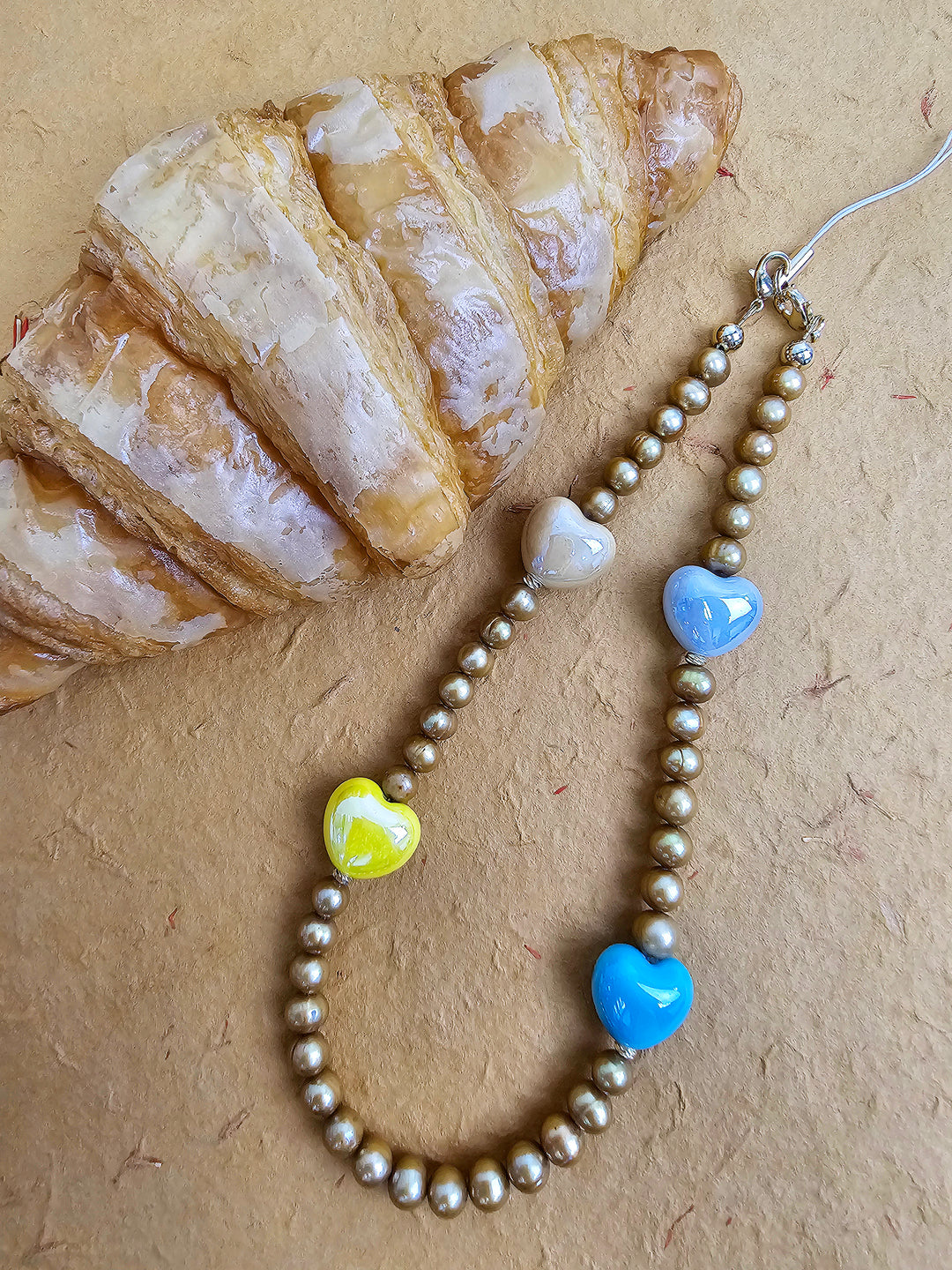 Golden Color Freshwater Pearls With Colorful Ceramic Hearts Phone Strap PC048