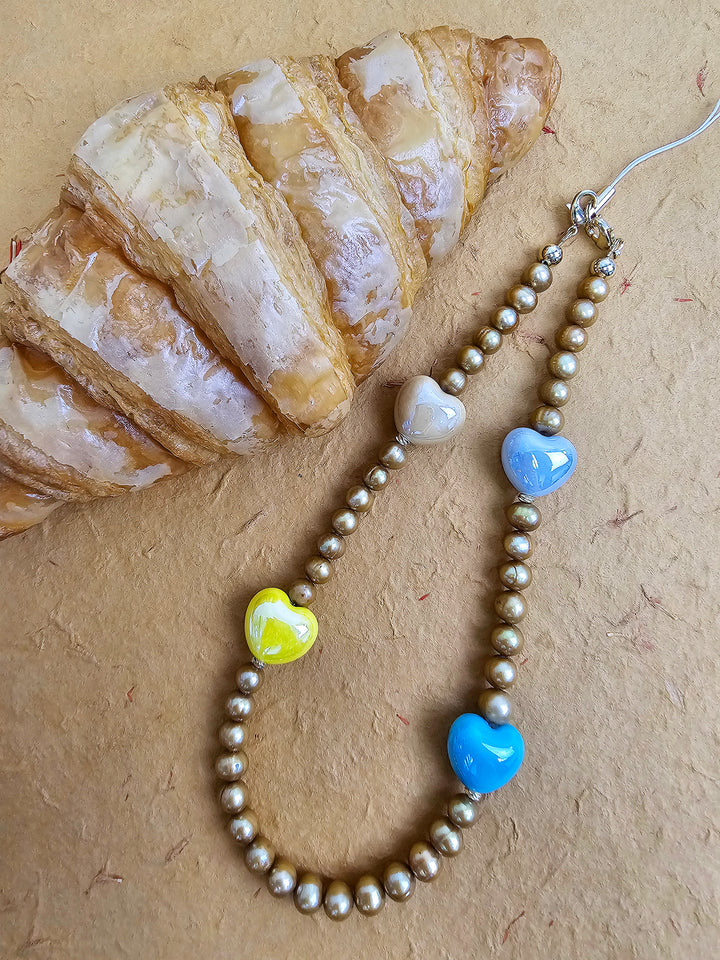 Golden Color Freshwater Pearls With Colorful Ceramic Hearts Phone Strap PC048