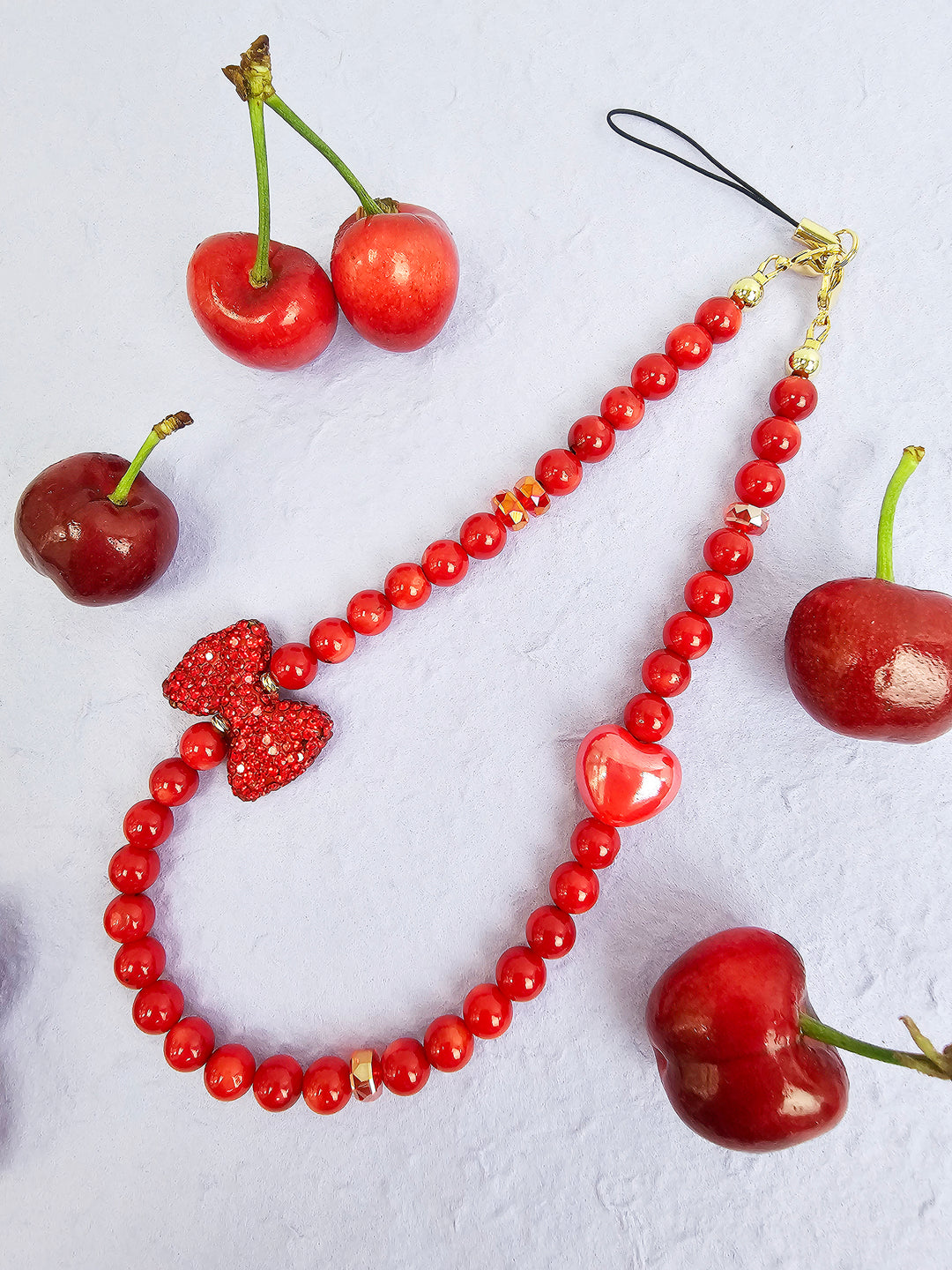 Red Bamboo Coral With Red Rhinestone Butterfly Knot Phone Strap PC069