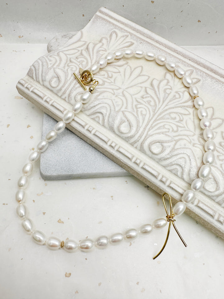 Contemporary Freshwater Pearls with Butterfly Knot Necklace LN066