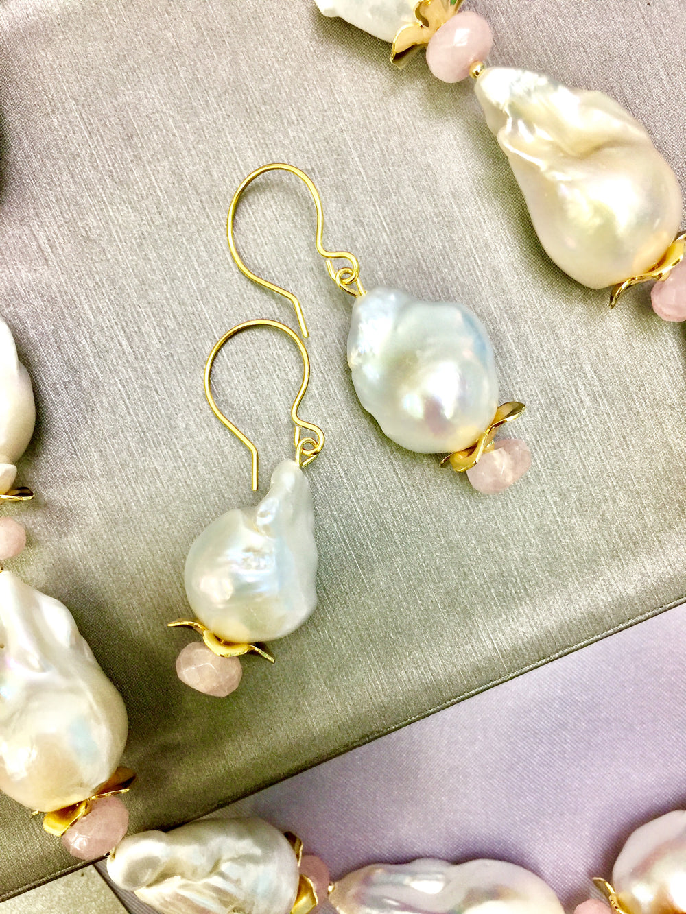 The unique baroque pearls add a touch of vintage charm, while the soft pink hues of the rose quartz exude timeless elegance. 